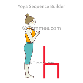 mountain pose prayer hands in front of chair (Tadasana Hasta Namaste In Front Of Chair)